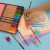 Magenta colored pencil from 36-color tin box set for colorful artworks